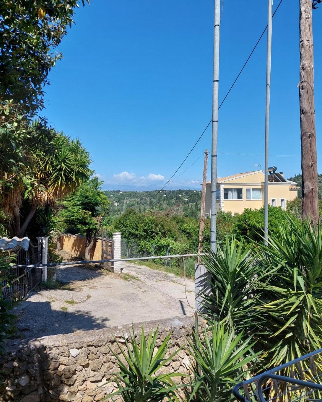 Thanos Guesthouse Corfu Agioi Deka  ภายนอก รูปภาพ